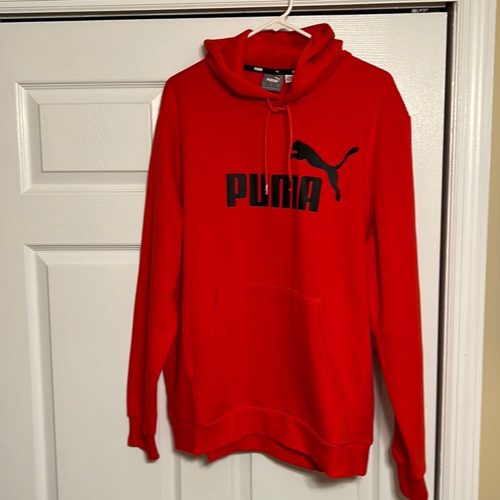 Puma pullover hoodie in red with black logo. Size XL new with tags.